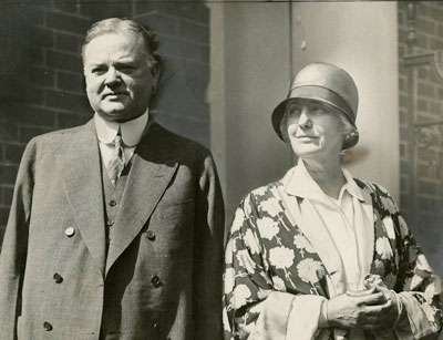Herbert and Lou Hoover in the doorway of their home the morning after he was nominated for president in 1928.