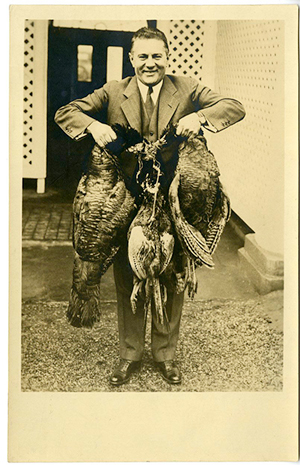 31-AL-56 Lawrence Richey with the turkeys he shot for the Hoover Thanksgiving dinner. 1930