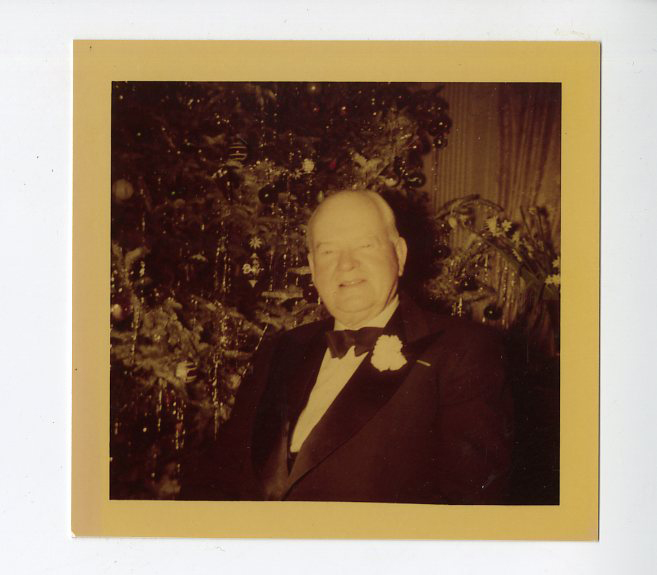 ca. Dec. 1952, Herbert Hoover in front of Christmas tree.