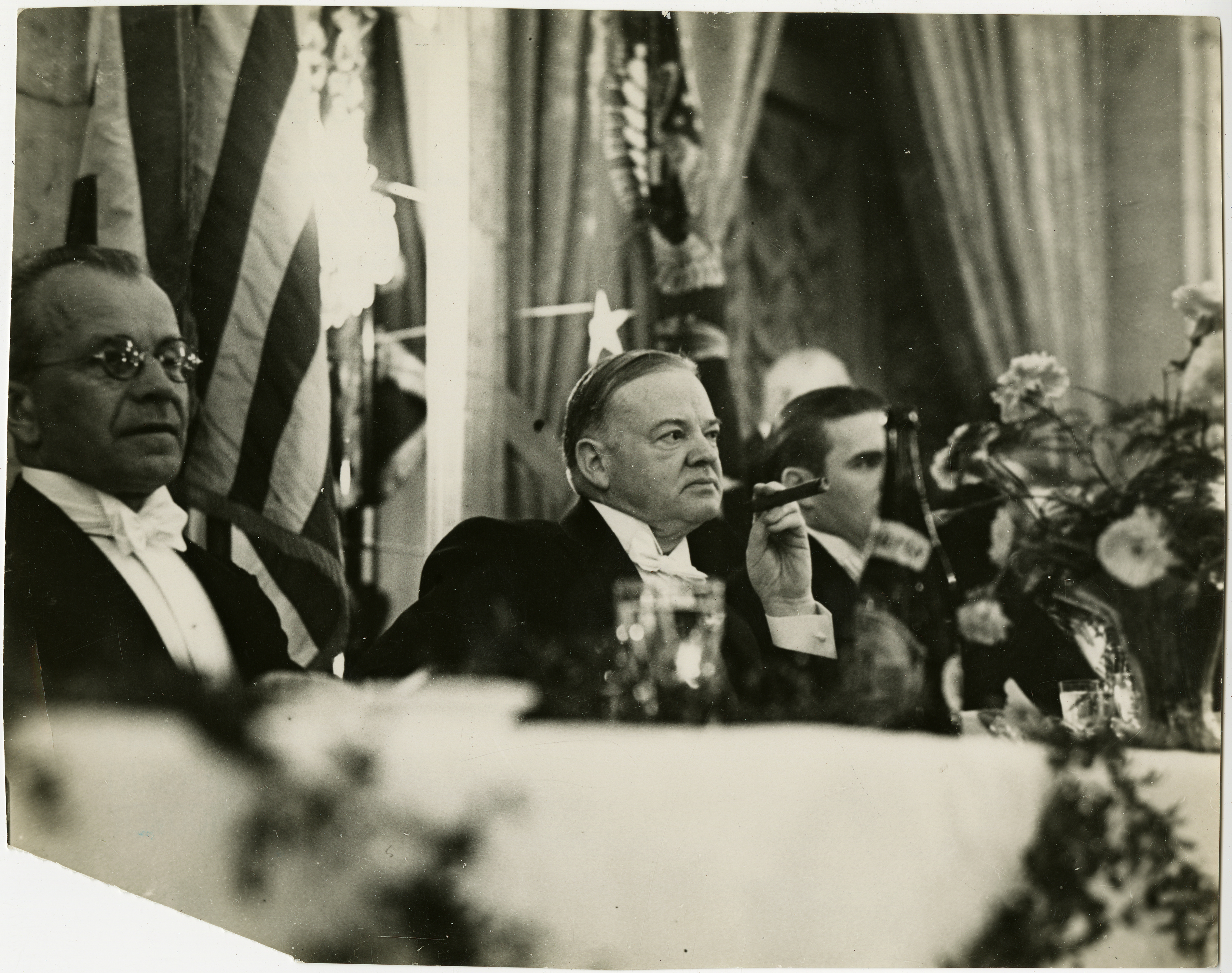Former president Hoover attending a dinner in Prague, March 4, 1938.
