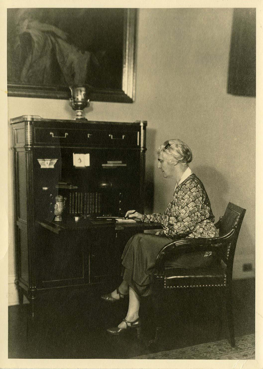 ou Henry Hoover sitting at the "Monroe Desk" - that was reproduced for the White House collection. ca 1931