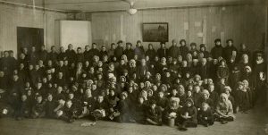 Children waiting for their Christmas dinner in one of the ARA kitchens. Reveal ca. 1920
