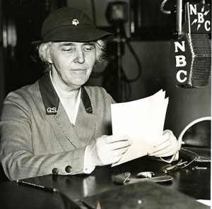 1936 Lou Hoover, president of the Girl Scouts, giving a national speech over the radio on "What does the future hold in store for our daughters."