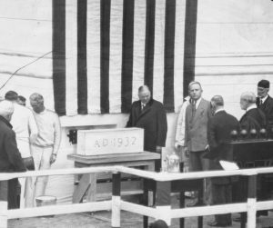 Presdient Hoover applies mortar to the cornerstone of the new Supreme Court building. 10/13/1932