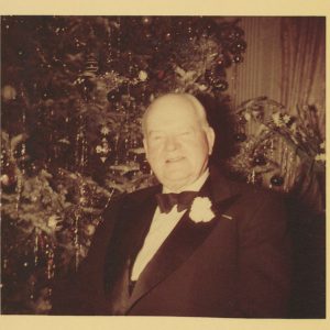 Former President Herbert Hoover celebrating the holidays in his Waldorf apartment. ca. 1952
